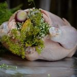 photos campfire roast chicken with flowering onion and dill