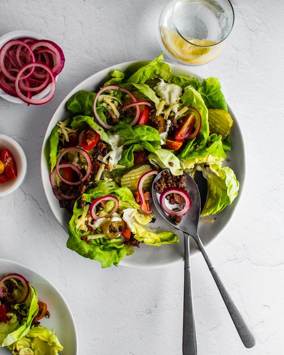 Burger bowls in white bowl on white surface