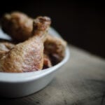 Oven-fried chicken in a white bowl