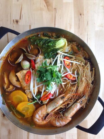 korean seafood stew in metal pot