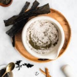 Homemade seasoning salt on white background