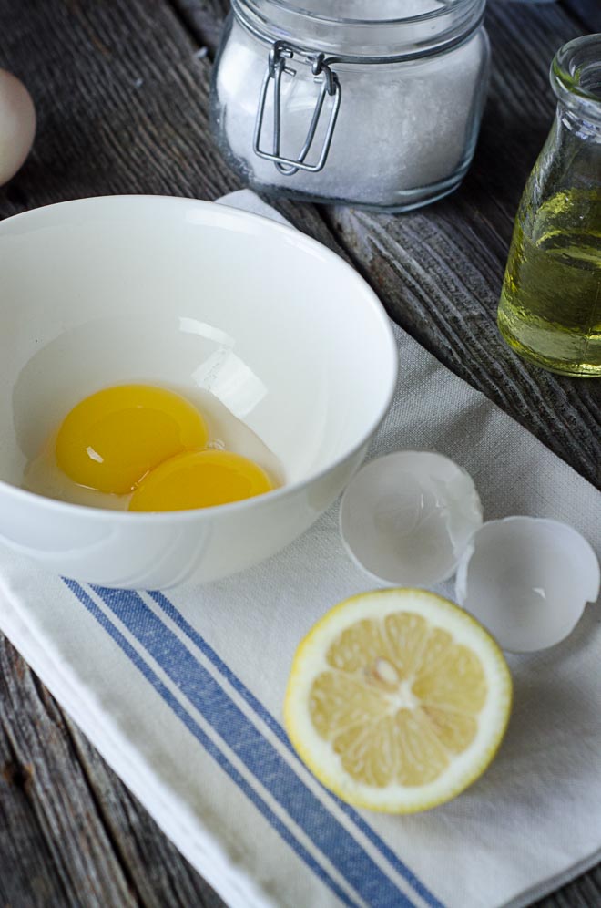 Egg yolks, lemon, salt and avocado oil for homemade avocado oil mayonnaise. #nourishedkitchen