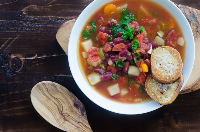 Super easy (and budget-friendly!) Bean and Vegetable Soup for the InstantPot. Made with kidney beans, carrots, onions, celery, garlic, kale and tomatoes.