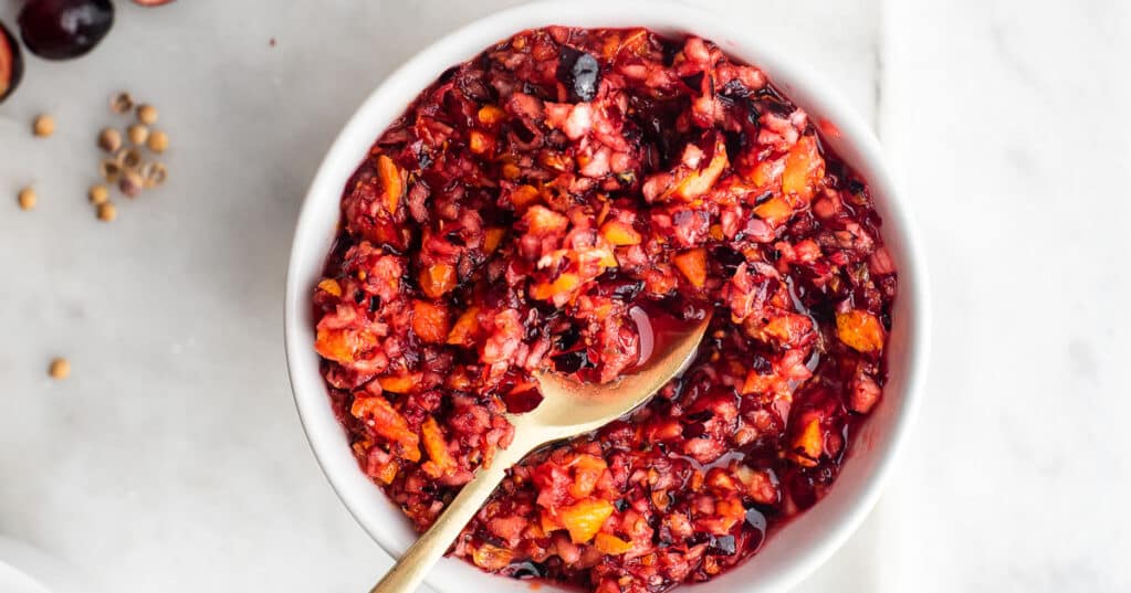 cranberry mandarin relish in a white bowl