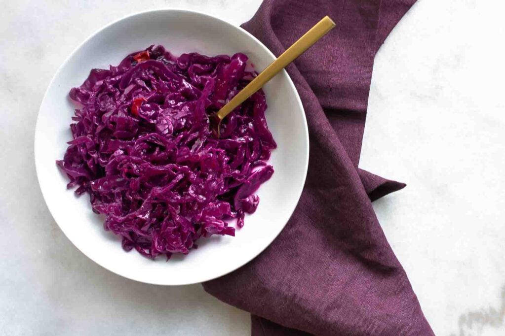 How to Make Jalapeño Sauerkraut with red cabbage and plenty of garlic.