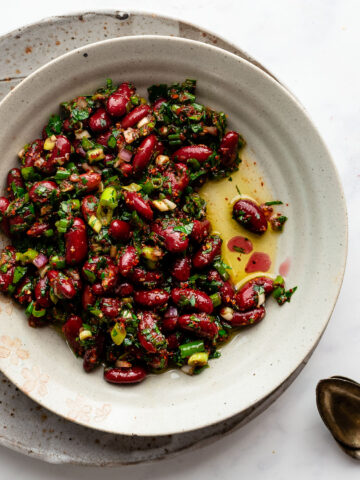 marinated kidney beans in an earthenware dish