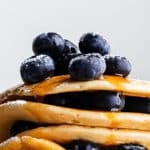 Close-up of einkorn pancakes garnished with blueberries