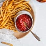 kimchi ketchup in a small bowl with french fries